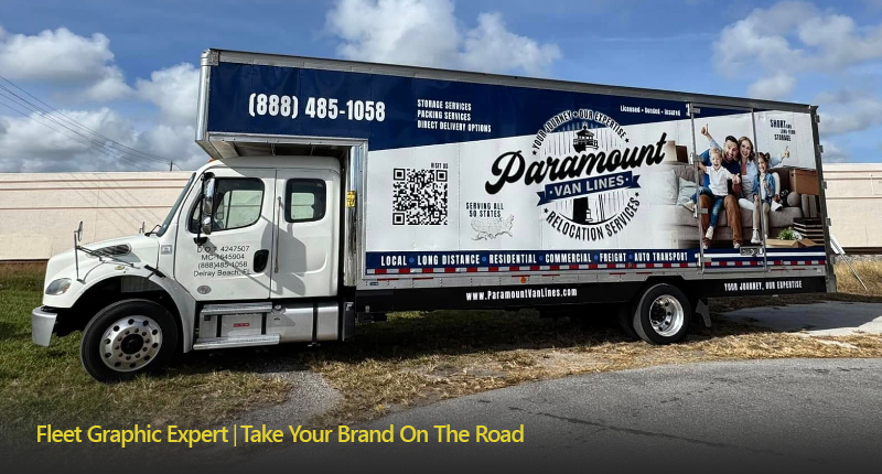 White box truck with Paramount brand graphics parked on the side of a road.