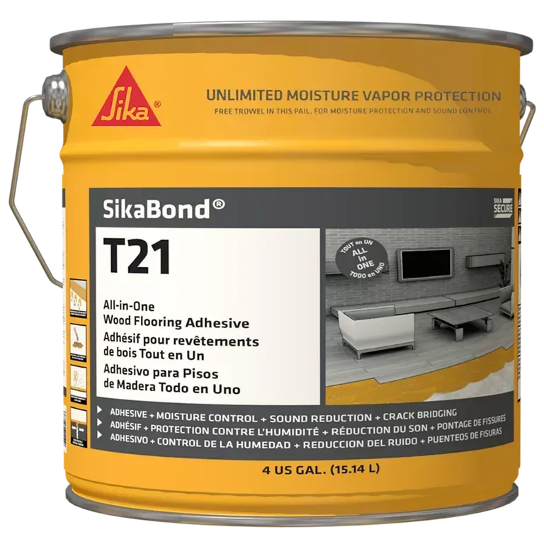 A bucket of sikabond t21 wood flooring adhesive