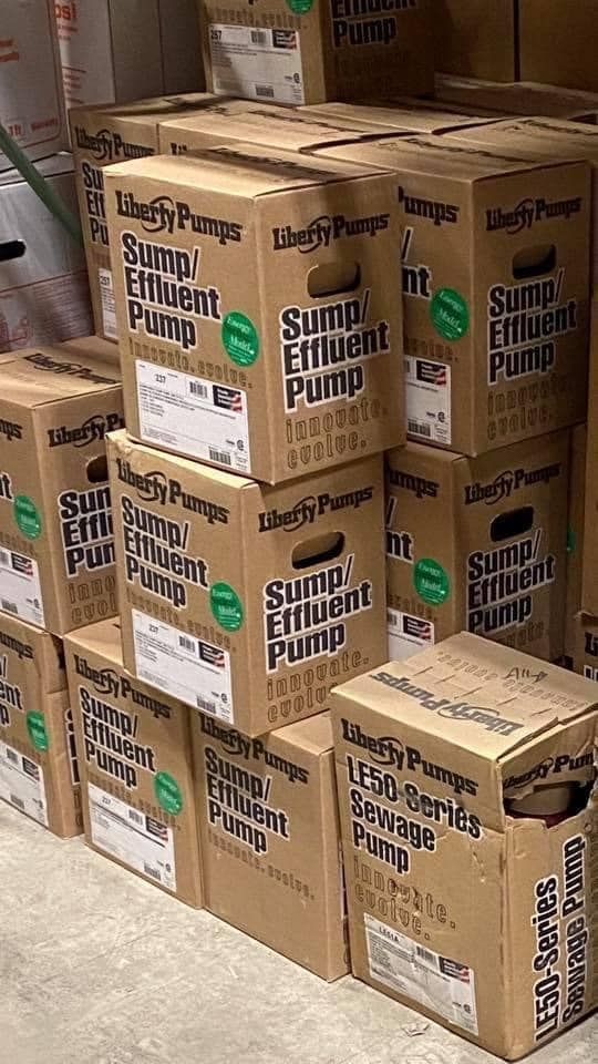 A bunch of cardboard boxes stacked on top of each other.