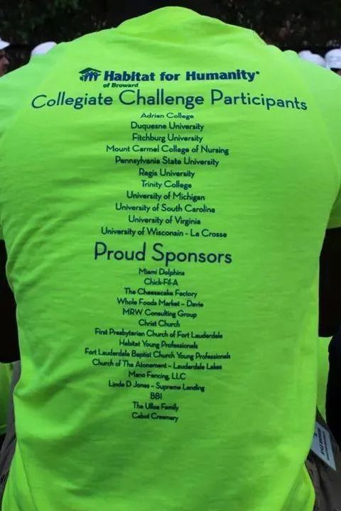 Bright green Habitat for Humanity t-shirt showing a list of Collegiate Challenge participants and sponsors on the back.