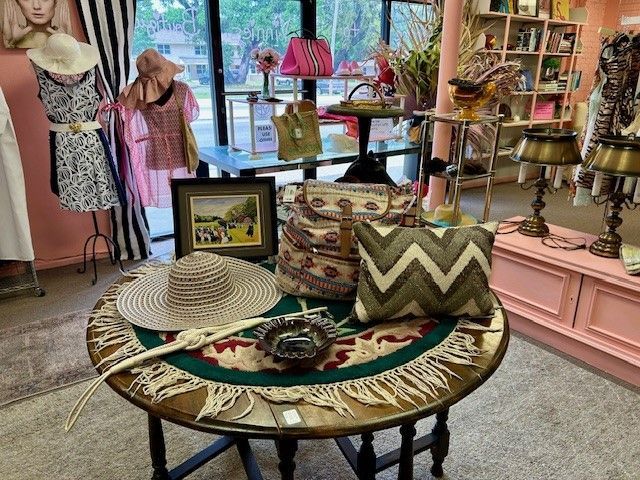 A table in a store with a hat on it