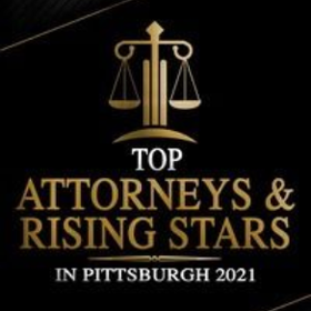 Gold legal scales logo with “Top Attorneys & Rising Stars in Pittsburgh 2021” on a black background