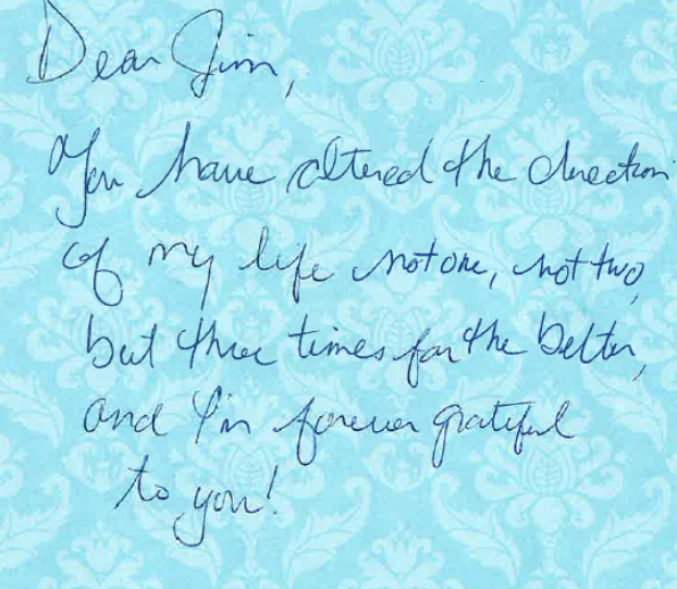 Handwritten note on a blue floral background, beginning “Dear Jim” and ending with “to you!”