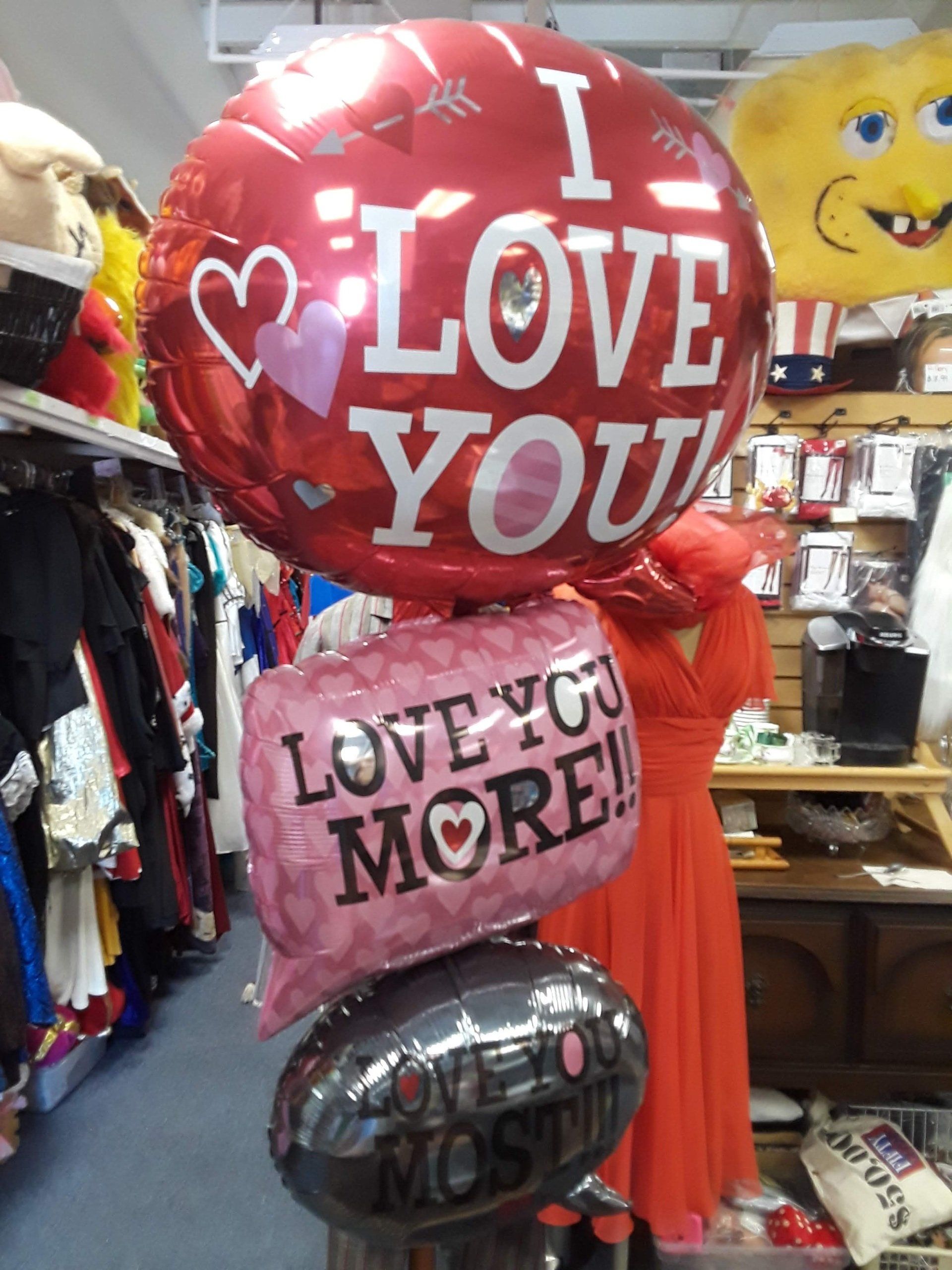 A bunch of balloons including one that says i love you