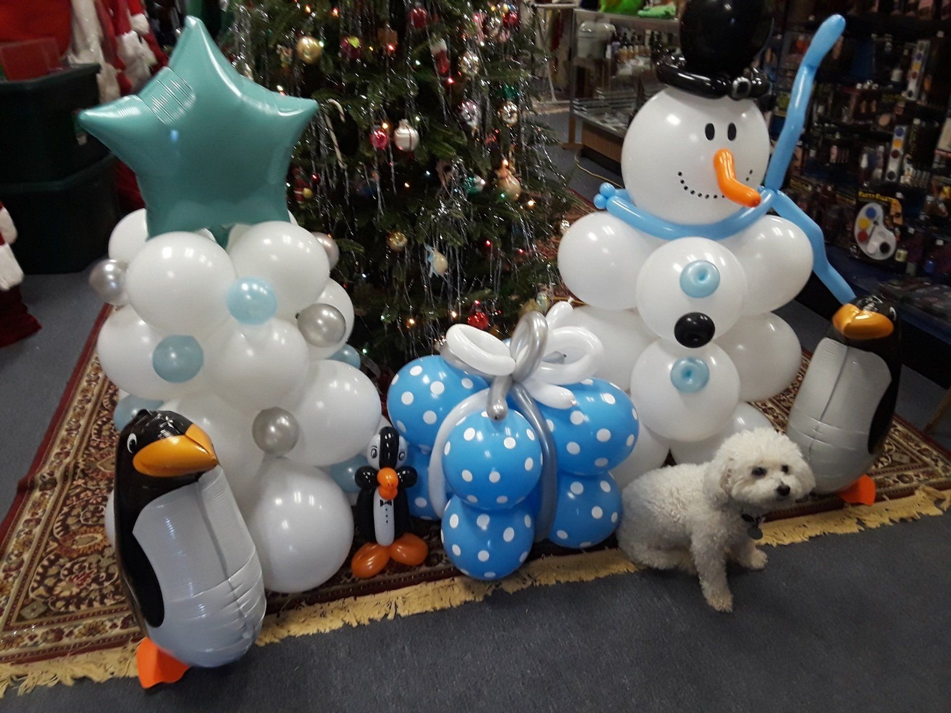 Snowman, gift, penguin, and tree