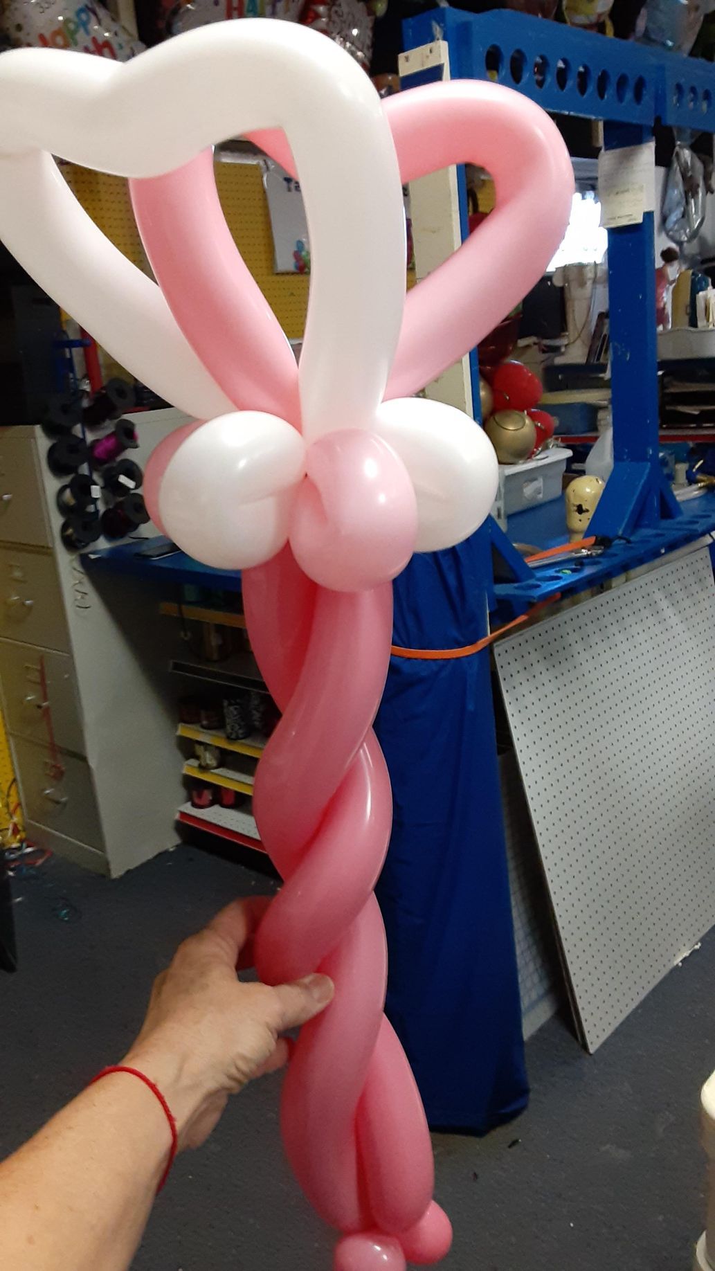 pink and white balloon