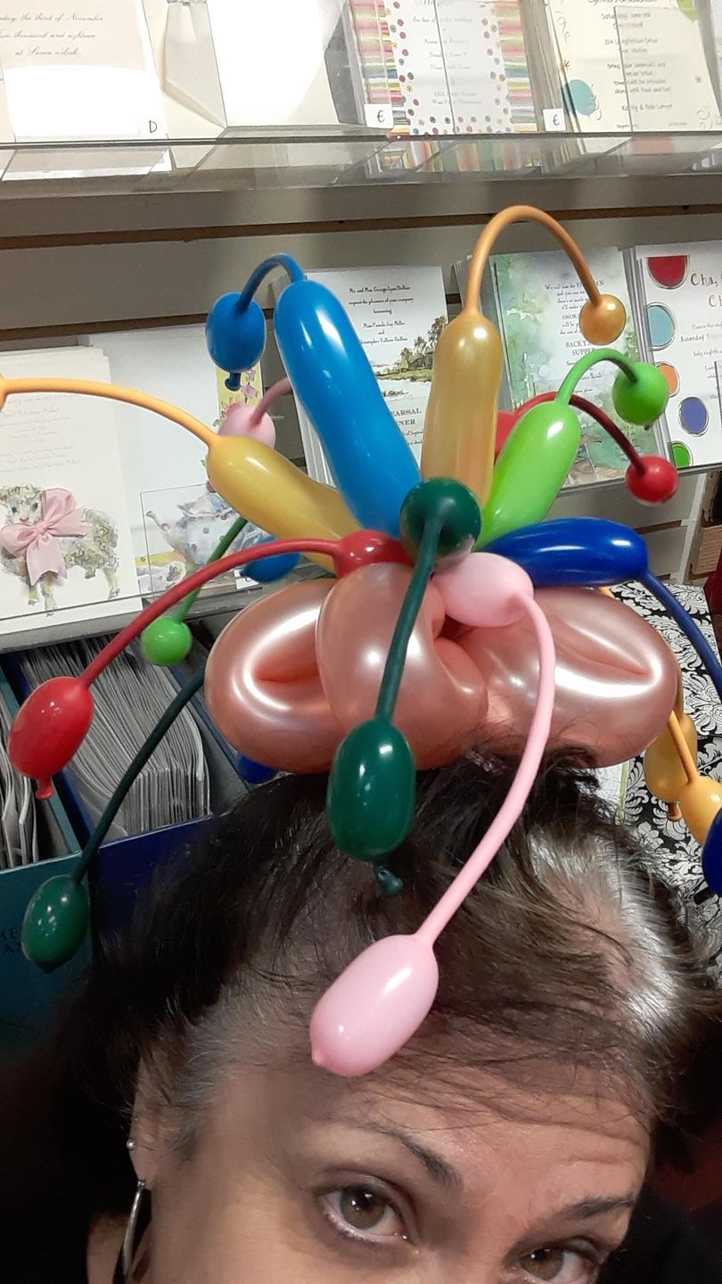 woman with balloon on her head