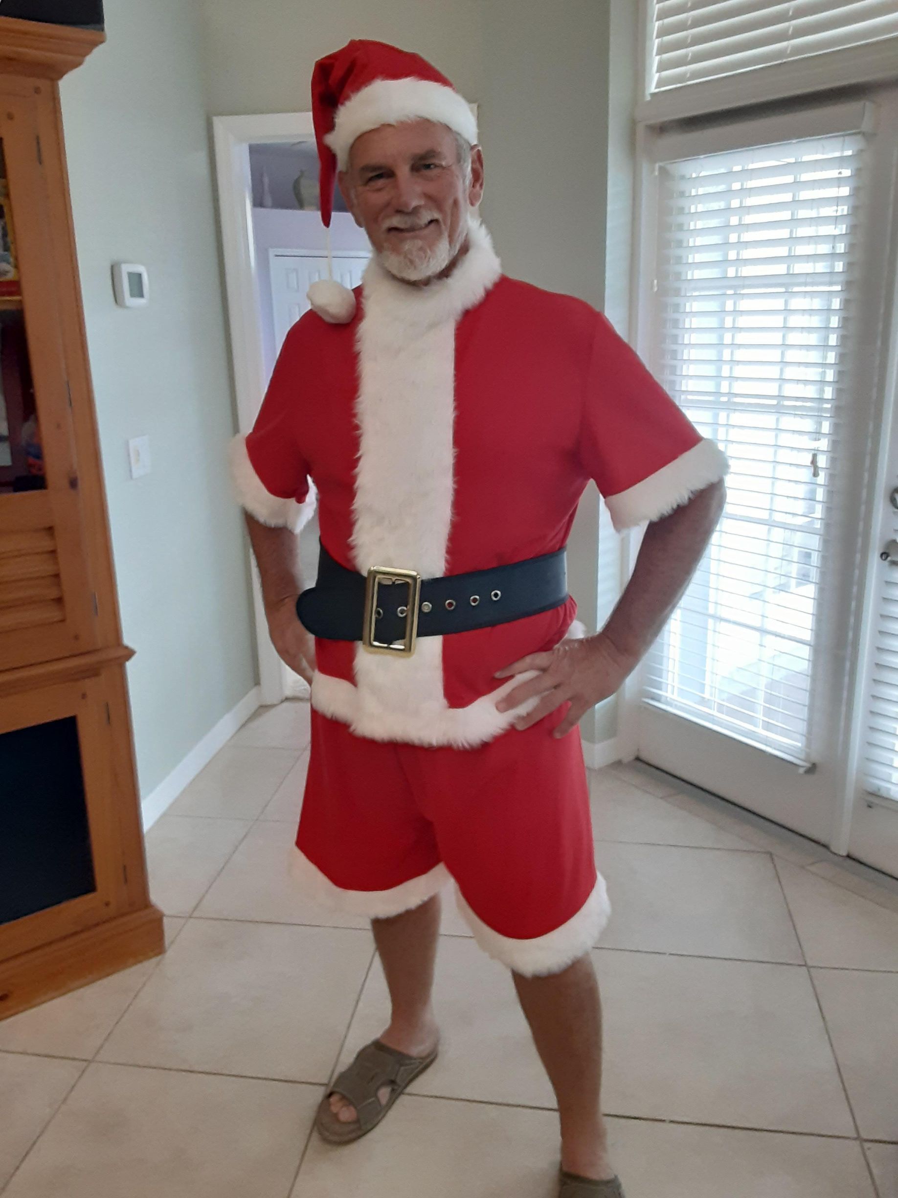 man wearing santa clause costume