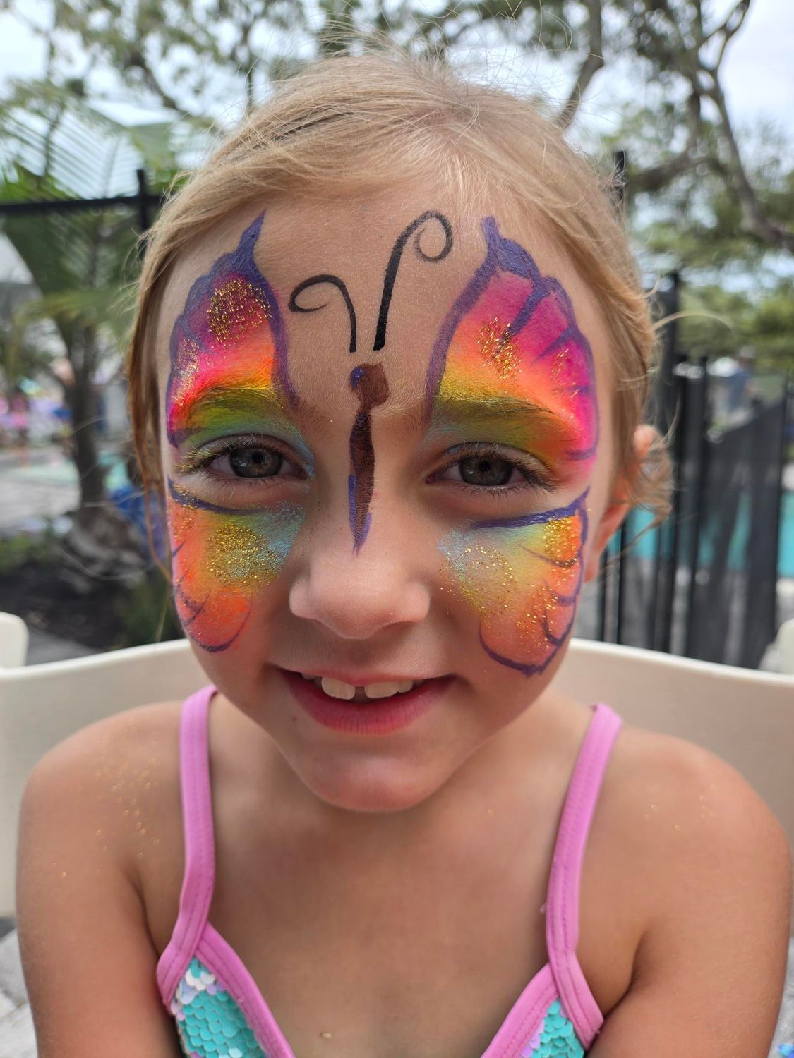 Girl with butterfly face paint