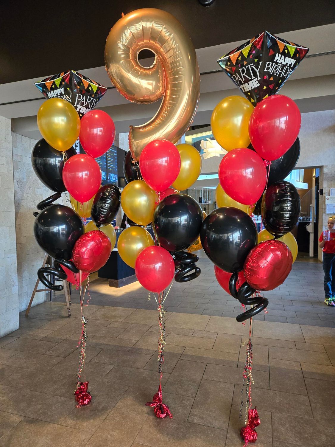 Balloons for a ninth birthday, gold 
