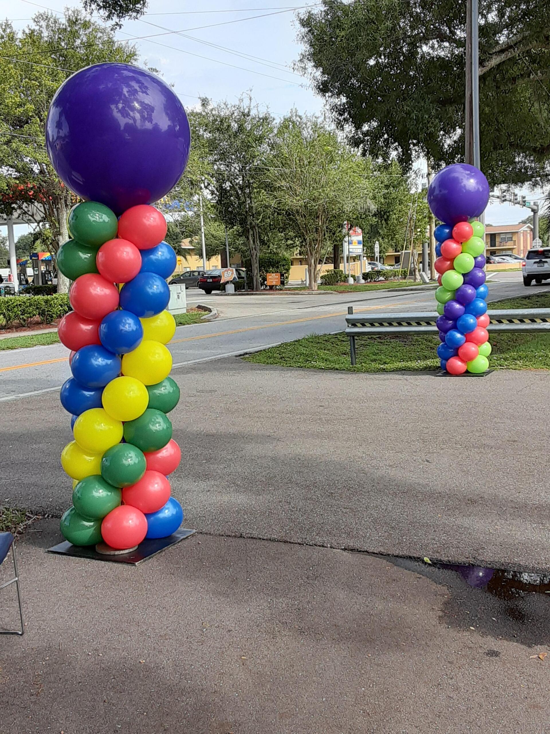 A bunch of balloons are stacked on top of each other