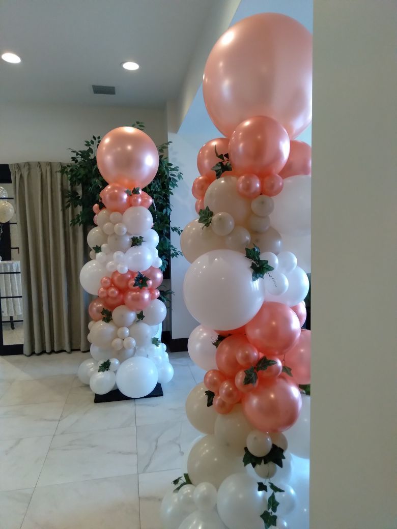 A bunch of balloons are stacked on top of each other