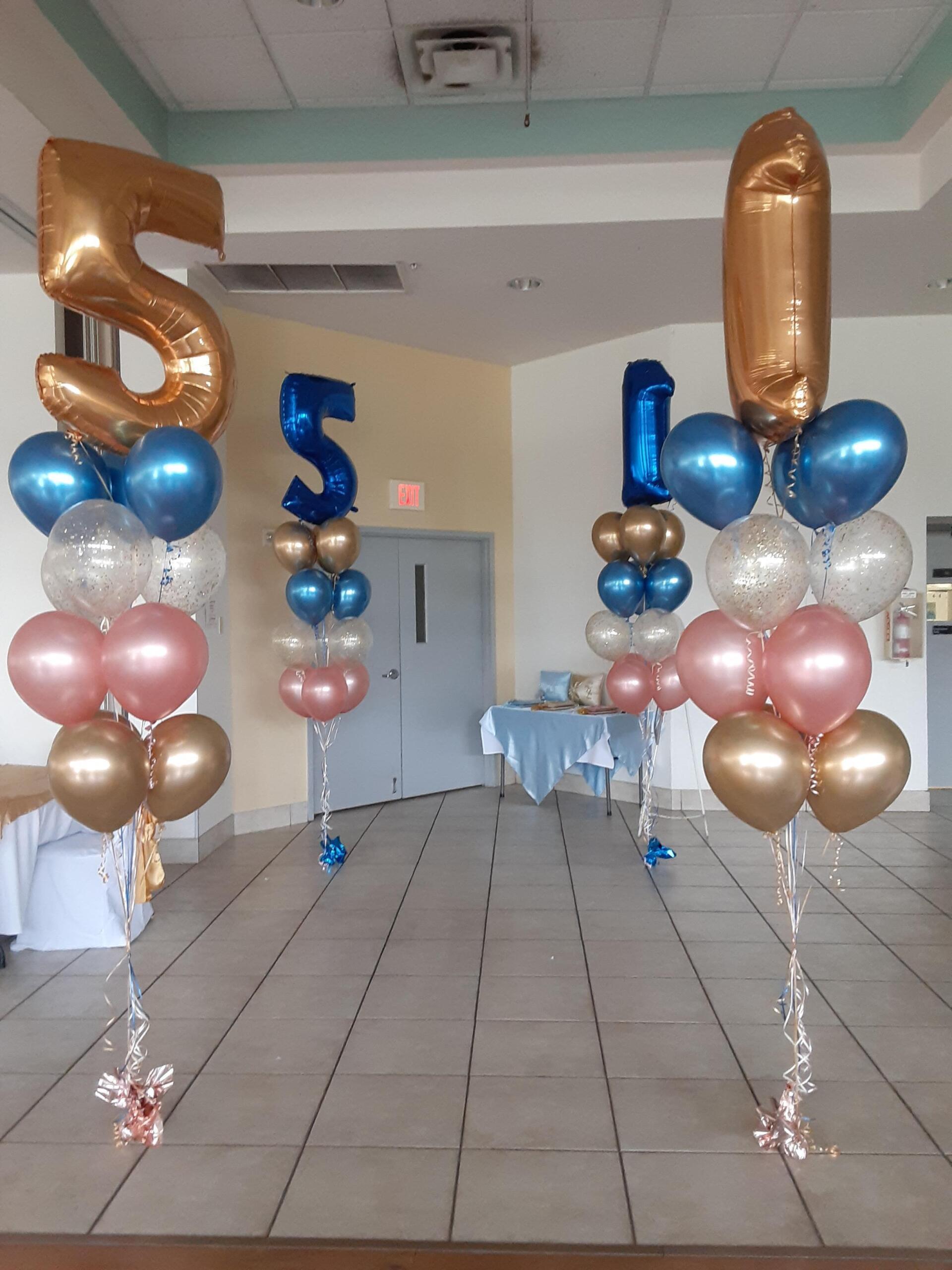 Two columns of balloons with numbers 5 and 1 on them