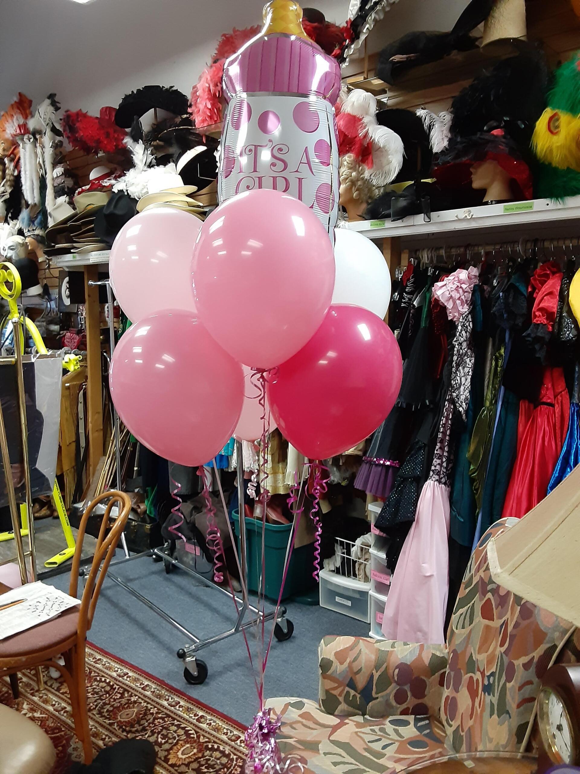 gender reveal pink balloons