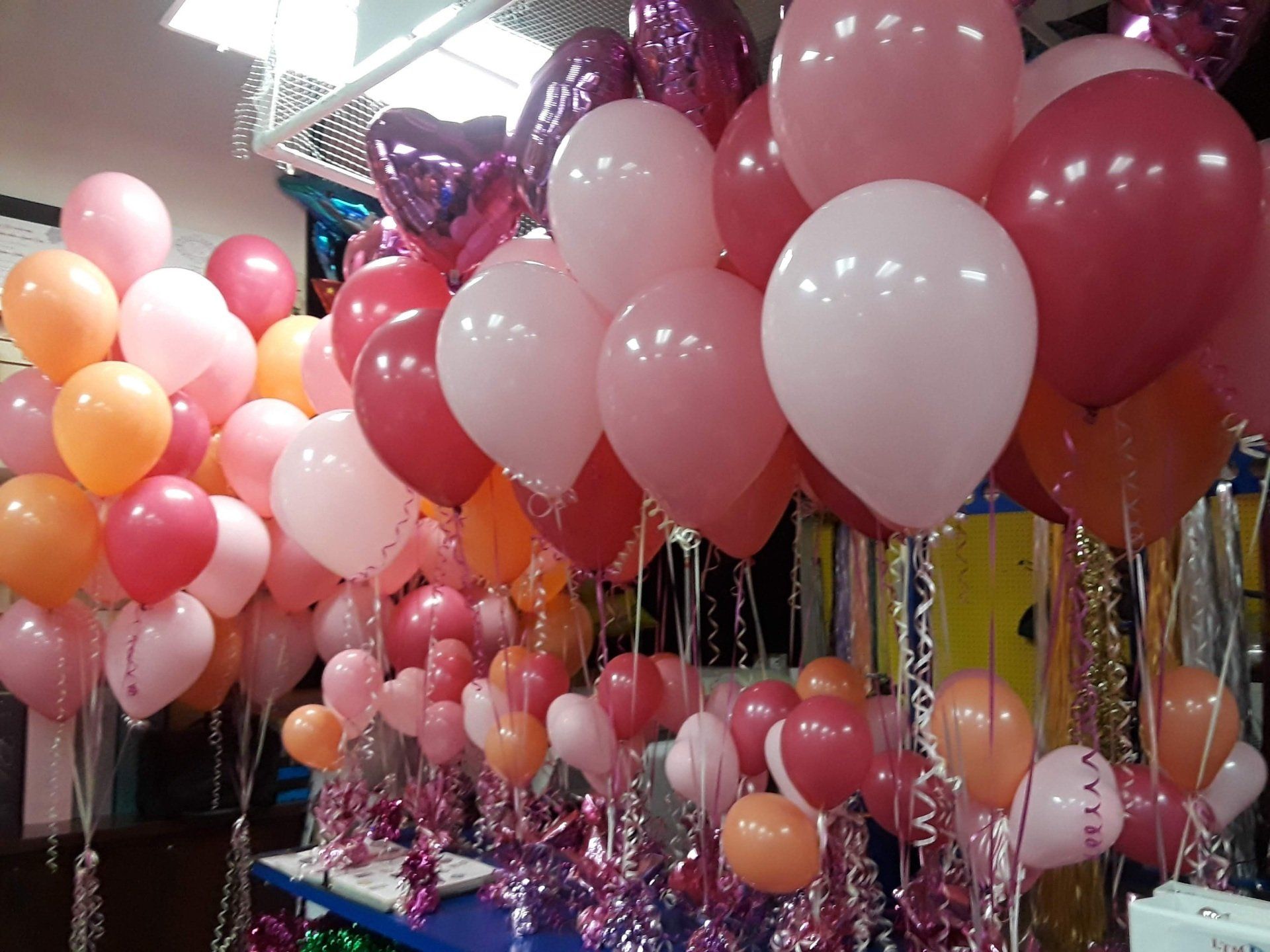 Pink and Orange balloon across table