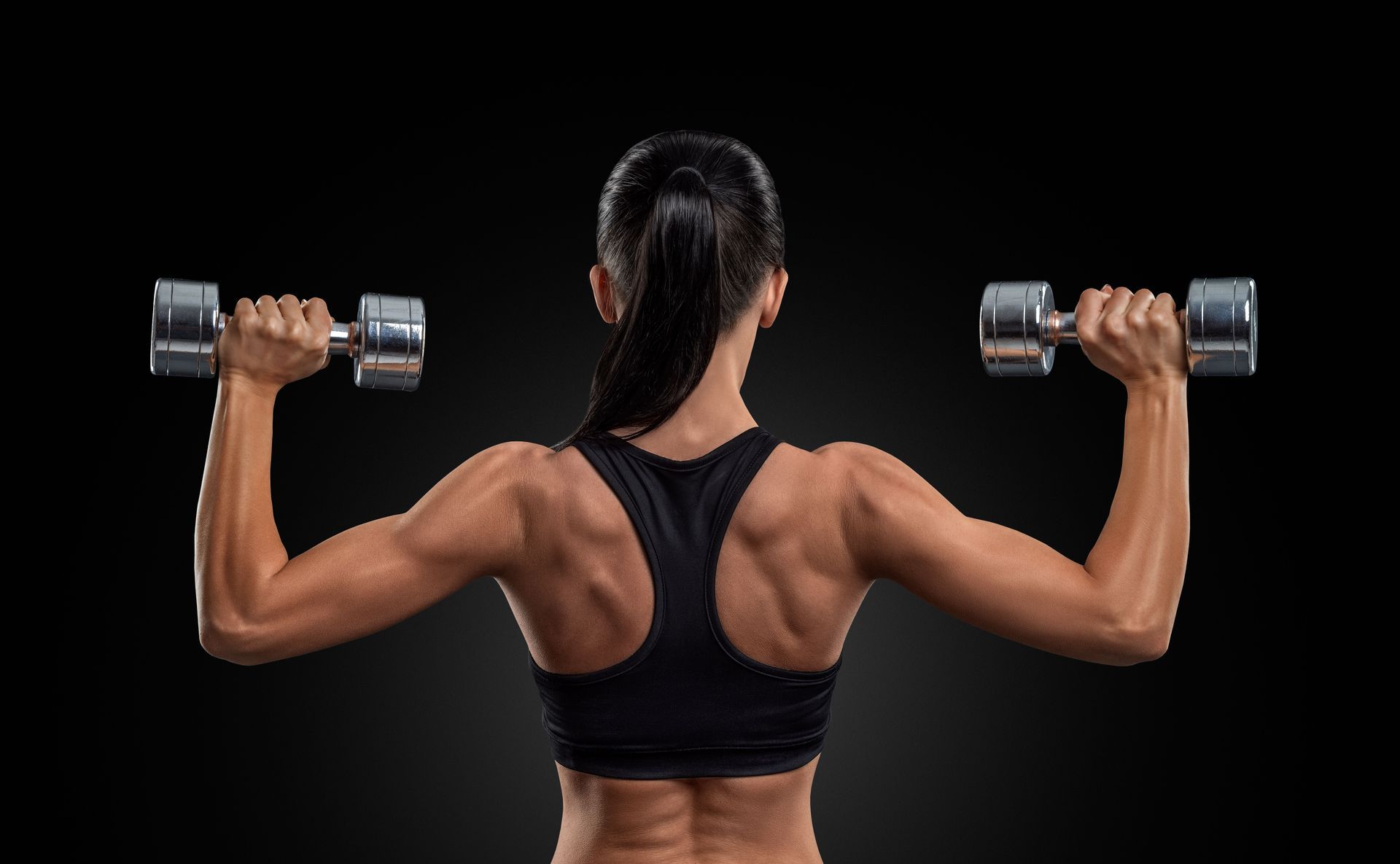 strong woman lifting weights