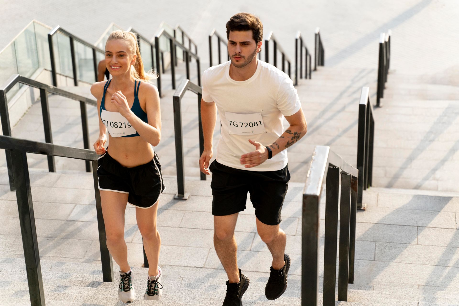 Couple on a run up stairs