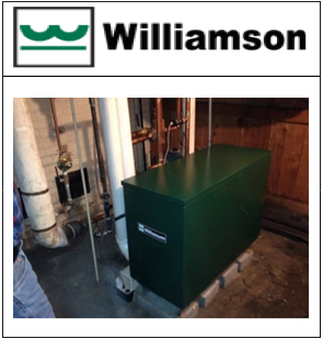 A picture of a green williamson box in a room