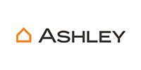 Ashley logo in black with an orange house icon on a white background
