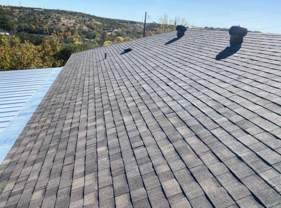 The roof of a house with a lot of shingles on it