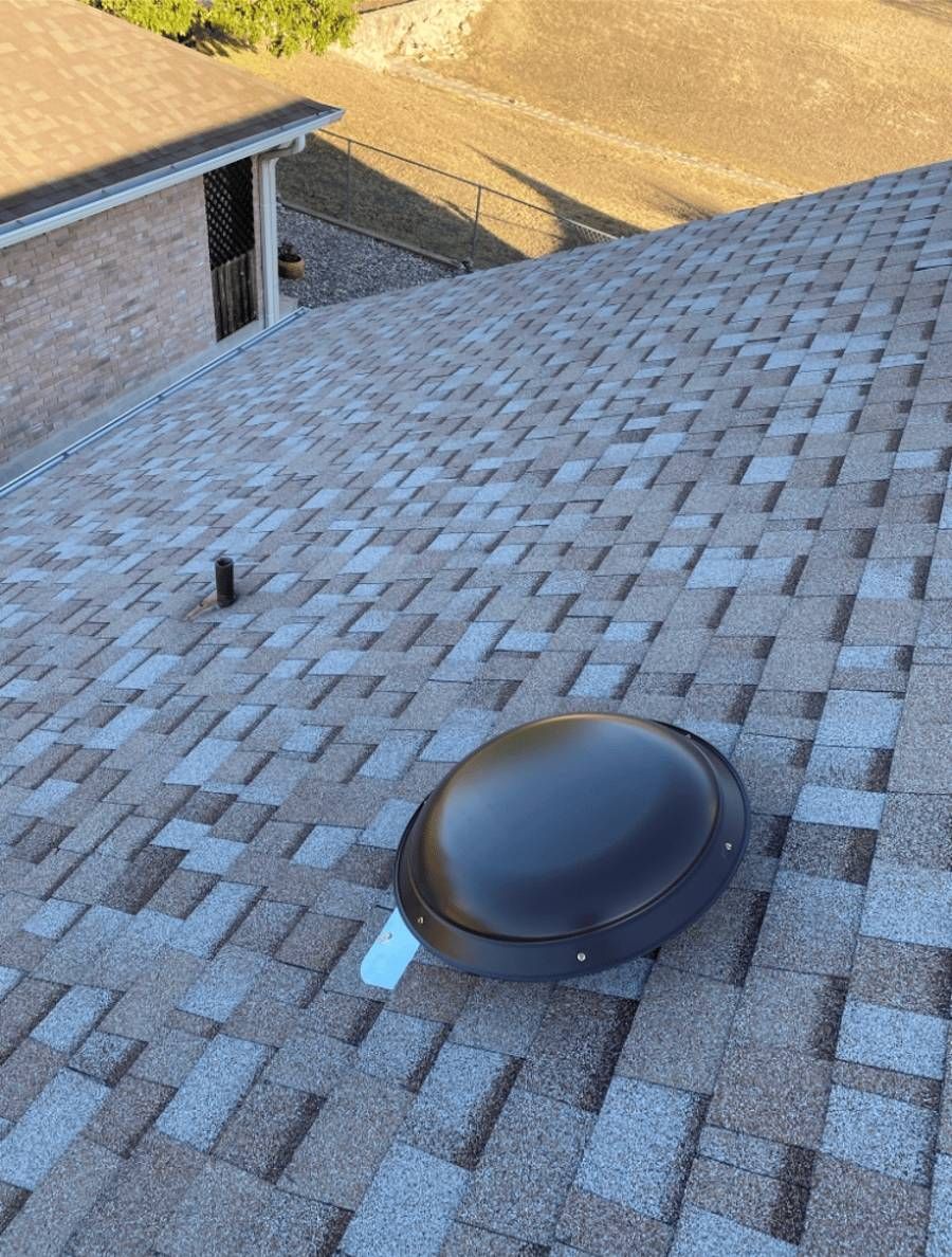 A roof with a dome on top of it