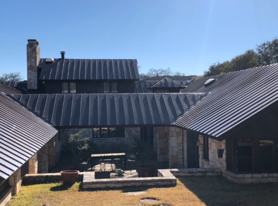 A large house with a metal roof