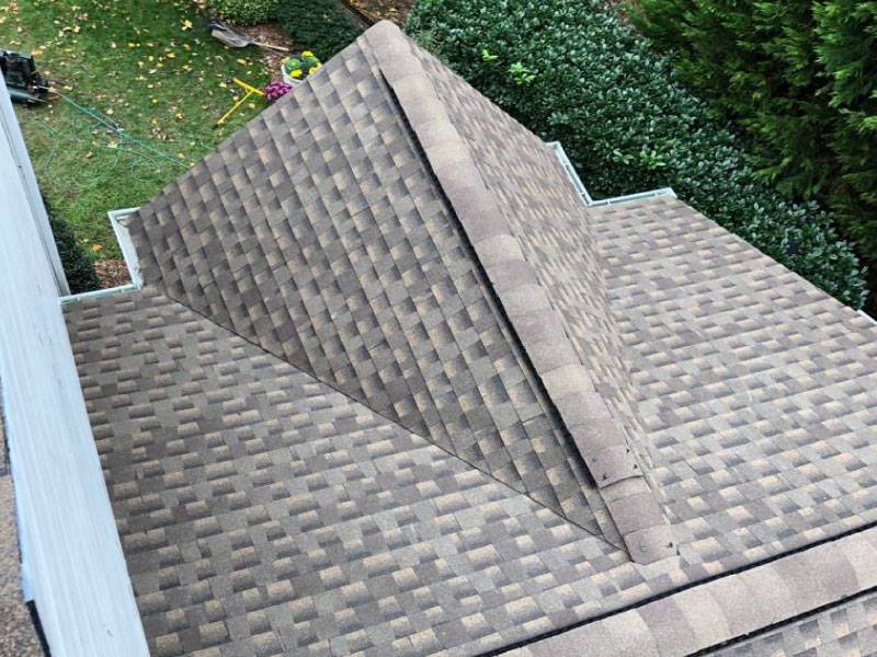 An aerial view of a roof with a lot of shingles on it.