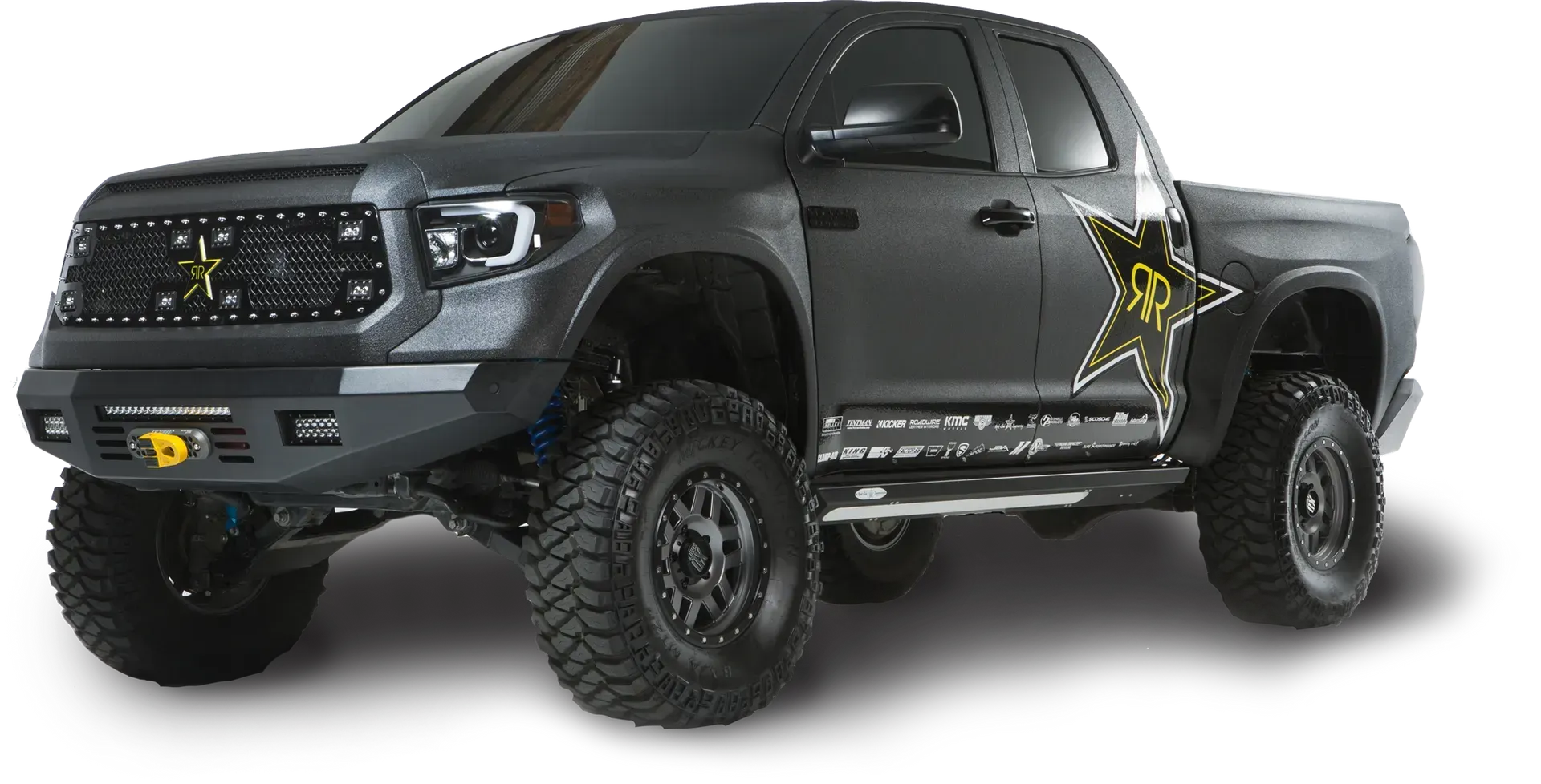 Black Toyota Tundra truck with Rockstar energy drink logo, off-road tires, and modified front.