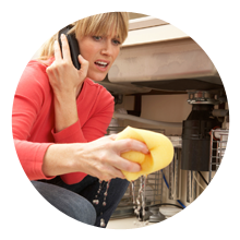 Woman calling a plumber