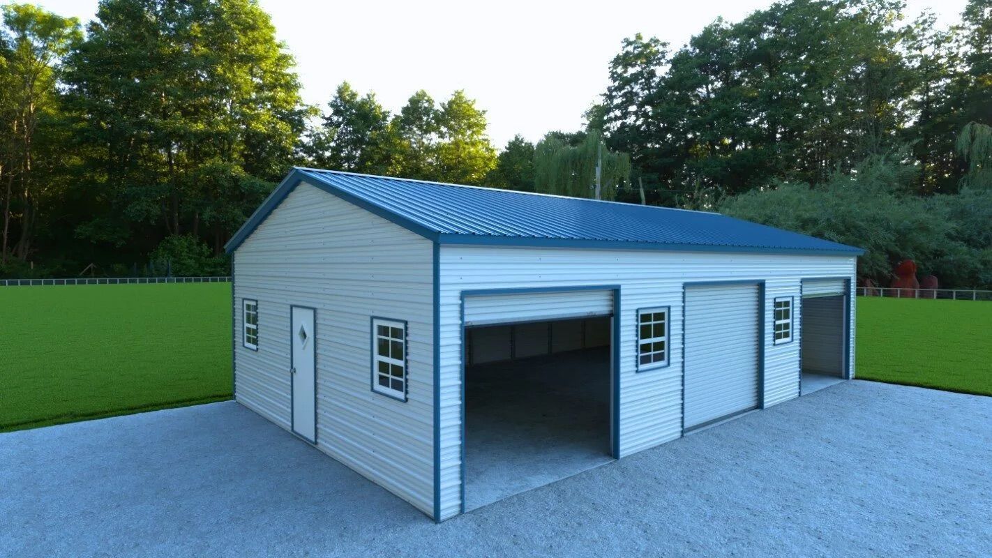 White metal garage with open bay doors on a gravel lot beside a grassy field and trees
