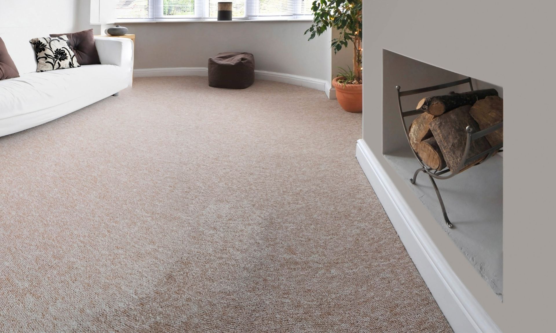 a living room with a fireplace and a couch.