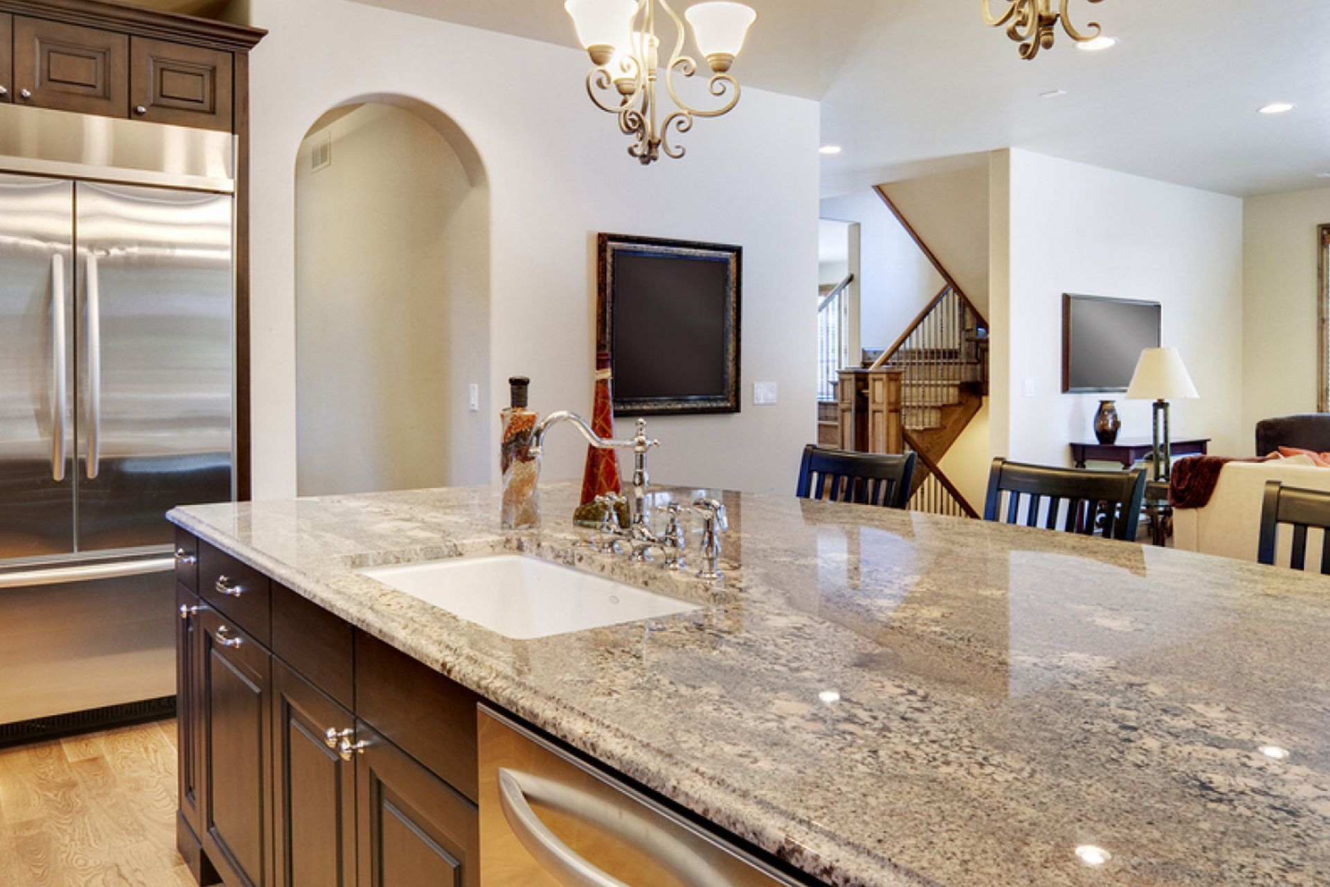 a kitchen with granite counter tops and stainless steel appliances.