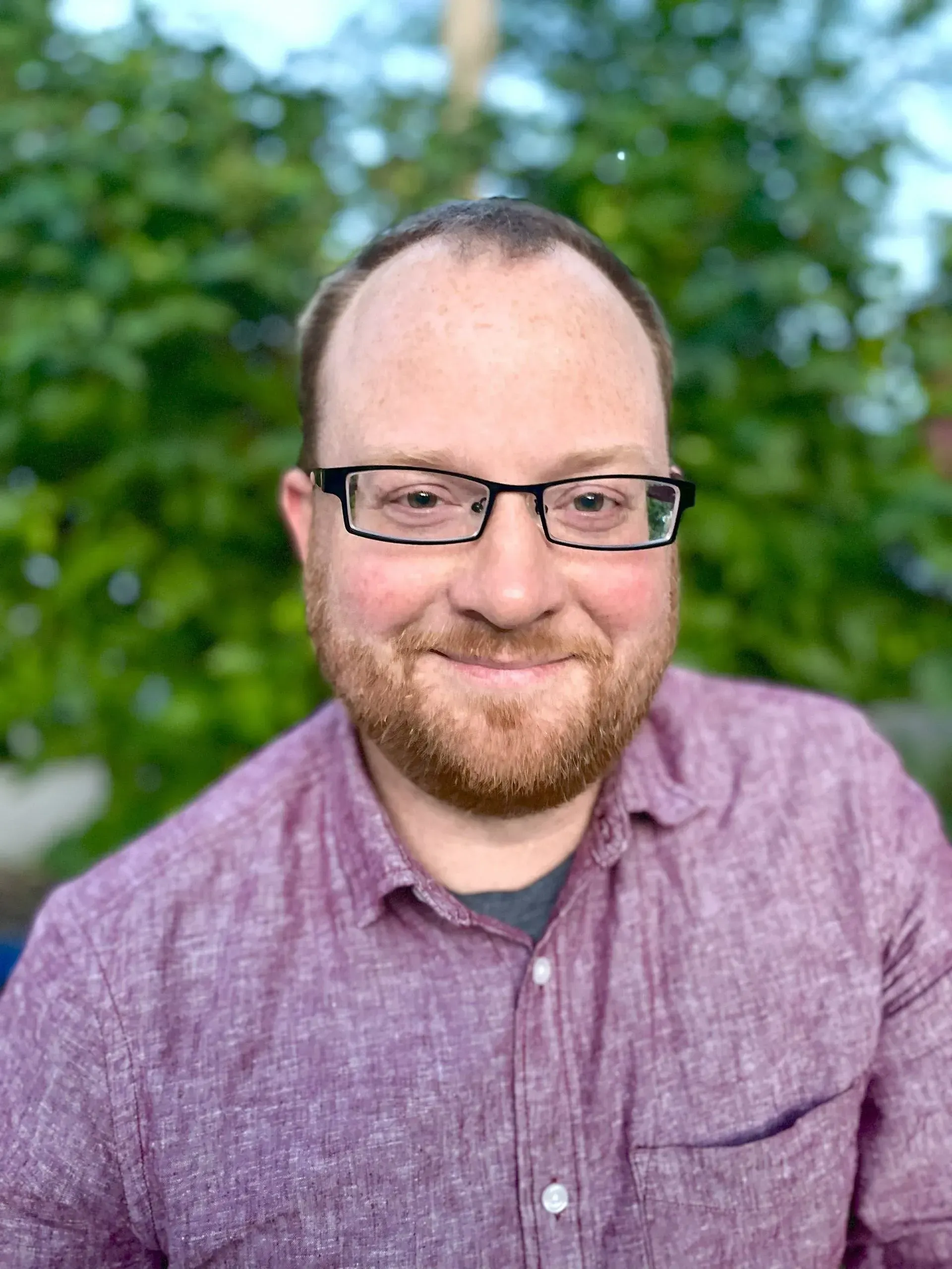 Photo of {{Team Member Name}}