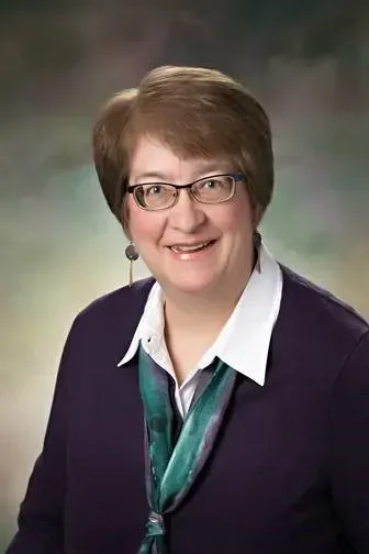 Photo of {{Team Member Name}}