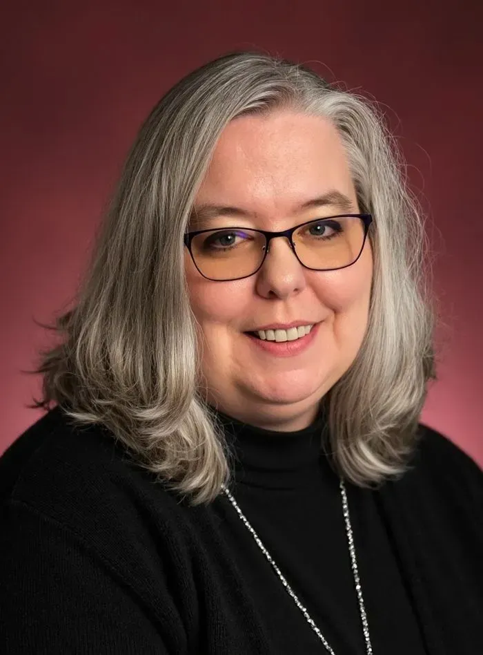 Photo of {{Team Member Name}}