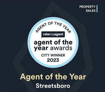 a sticker that says agent of the year on it