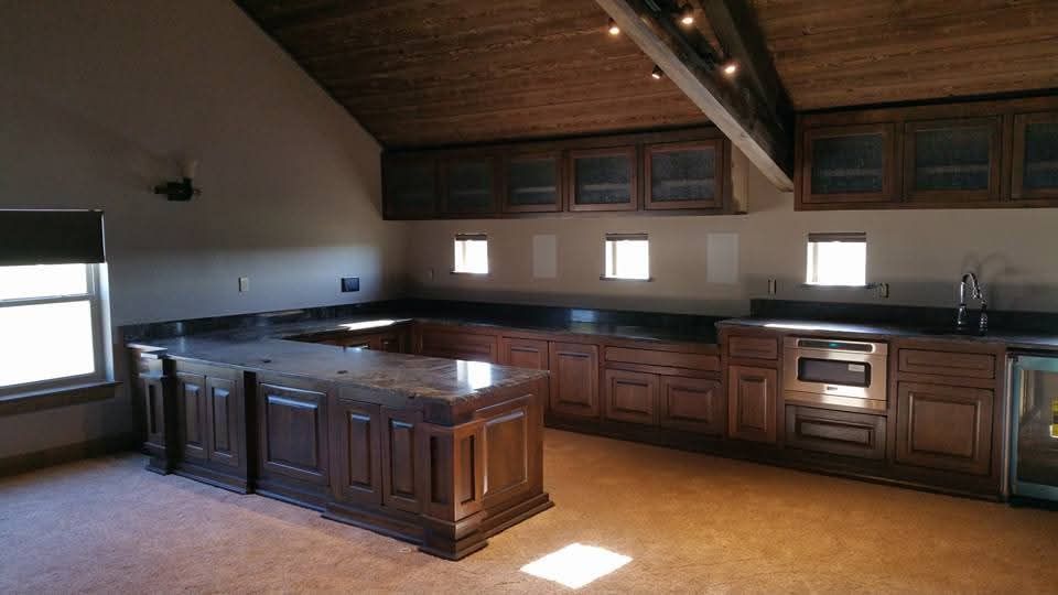 There is a large island in the middle of the kitchen