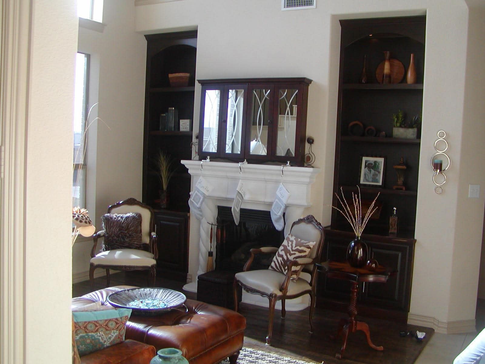 A living room filled with furniture and a fireplace