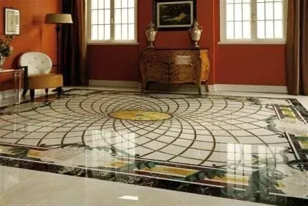 Elegant room with a large circular mosaic floor, red walls, windows, and a fireplace mantel