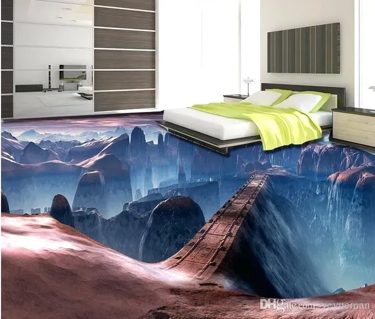 Modern bedroom with a bed above a surreal canyon floor mural and rope bridge design