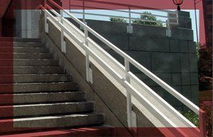 Concrete stairs with metal hand rails