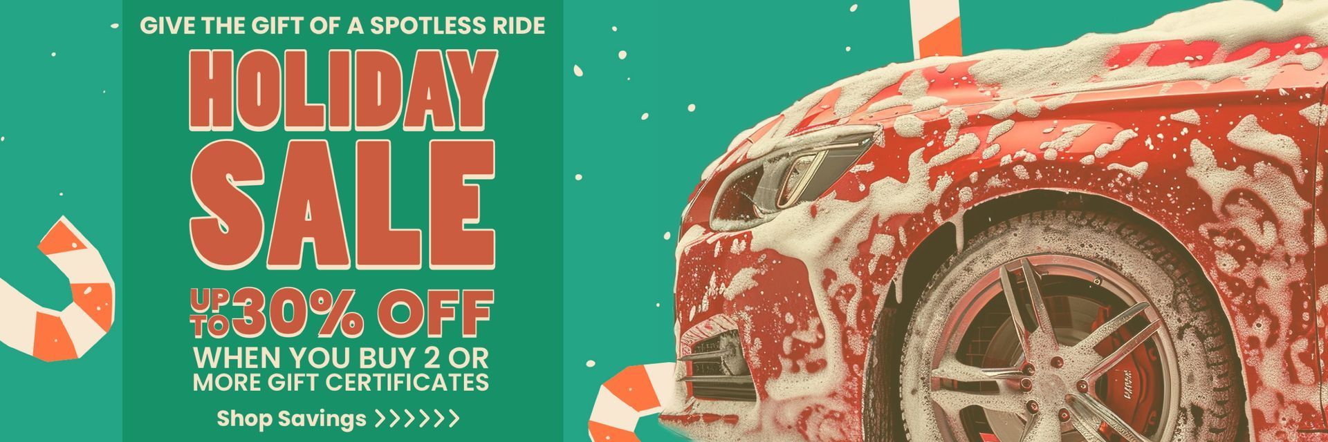 Holiday sale ad. A red car is covered in soap. Text offers 30% off when buying 2 or more car washes.