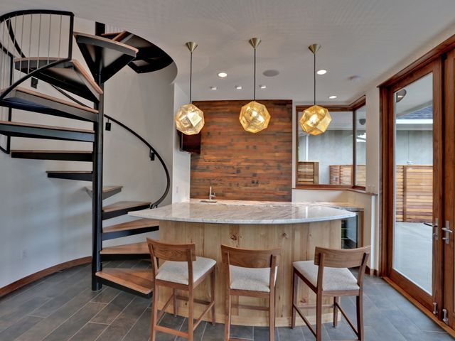 Kitchen bar with creative lighting fixtures