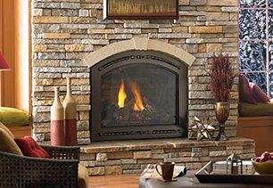 Fireplace surrounded by stones