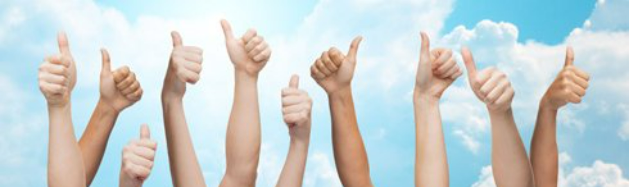 human hands showing thumbs up over blue sky and white clouds background