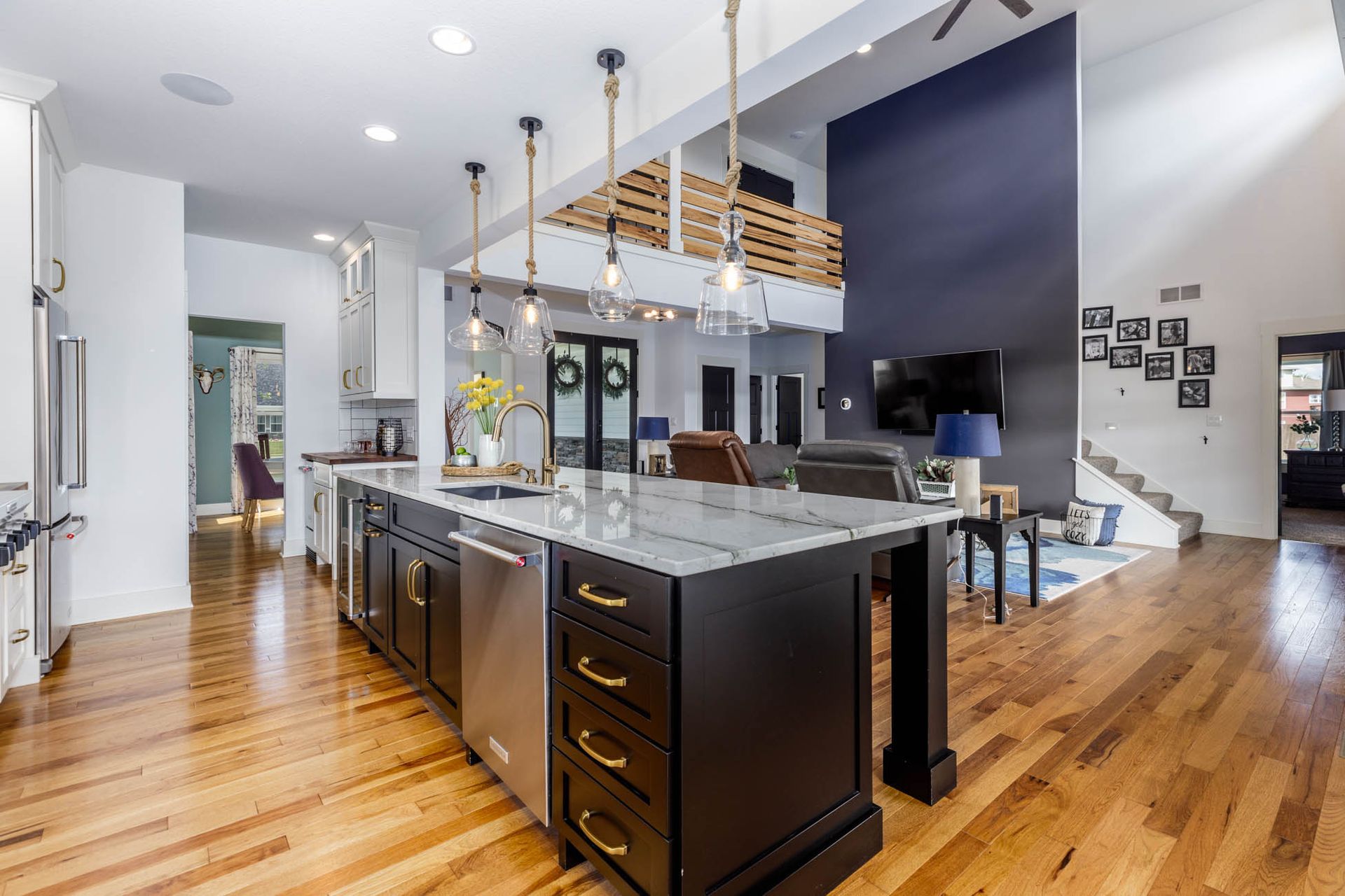 There is a large island in the middle of the kitchen