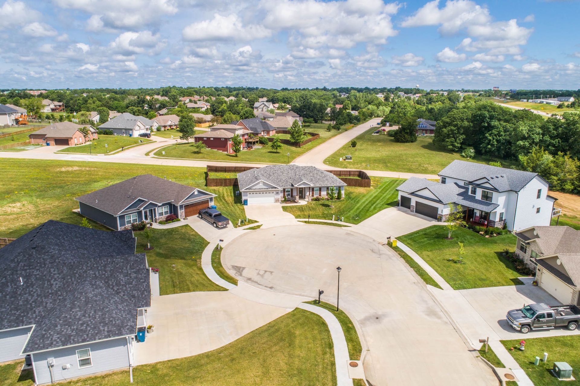 An aerial view of a residential neighborhood with lots of houses
