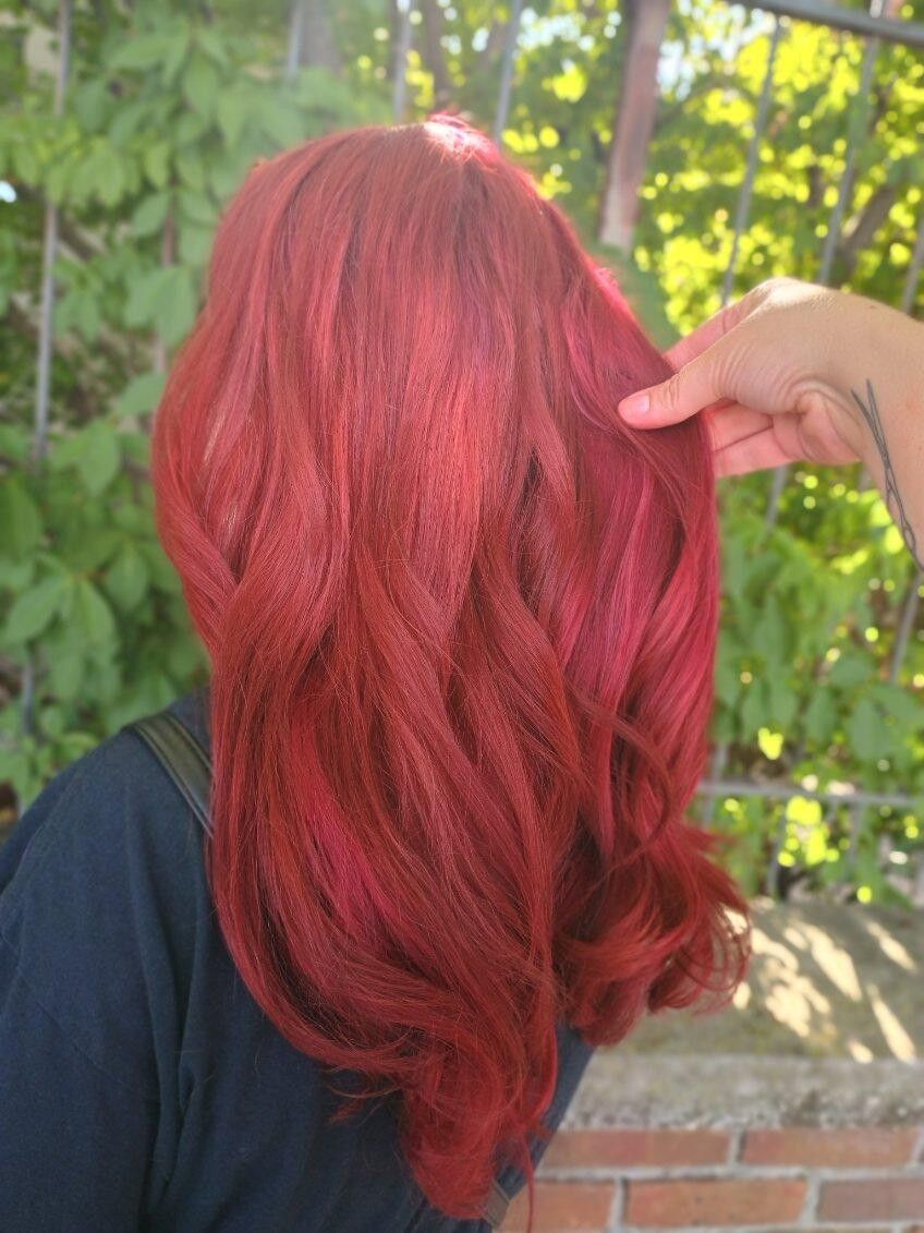Woman with wavy red hair