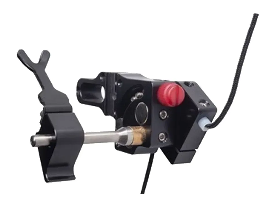 Black mechanical device with a red butto.