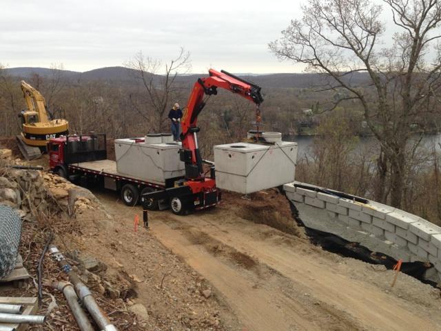 Truck transferring septic tank